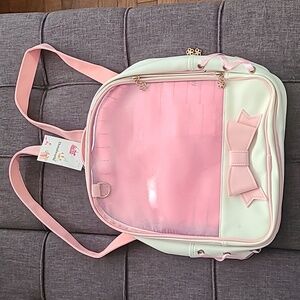 Donalworld white Pink‎ bow backpack faux leather NWT